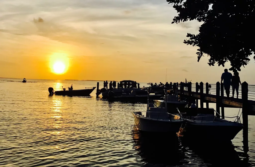 The sun setting over a fishing quay in Key largo an the Florida Keys