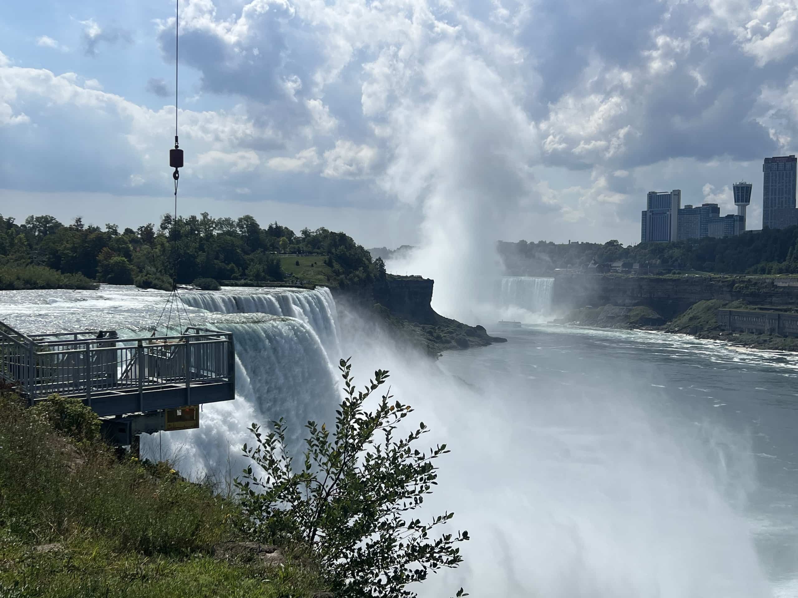 East_Coast_Roadtrip_Niagara_00006 A view of American Falls at NIagara Falls with mist and water spray rising from Horseshoe falls in the background