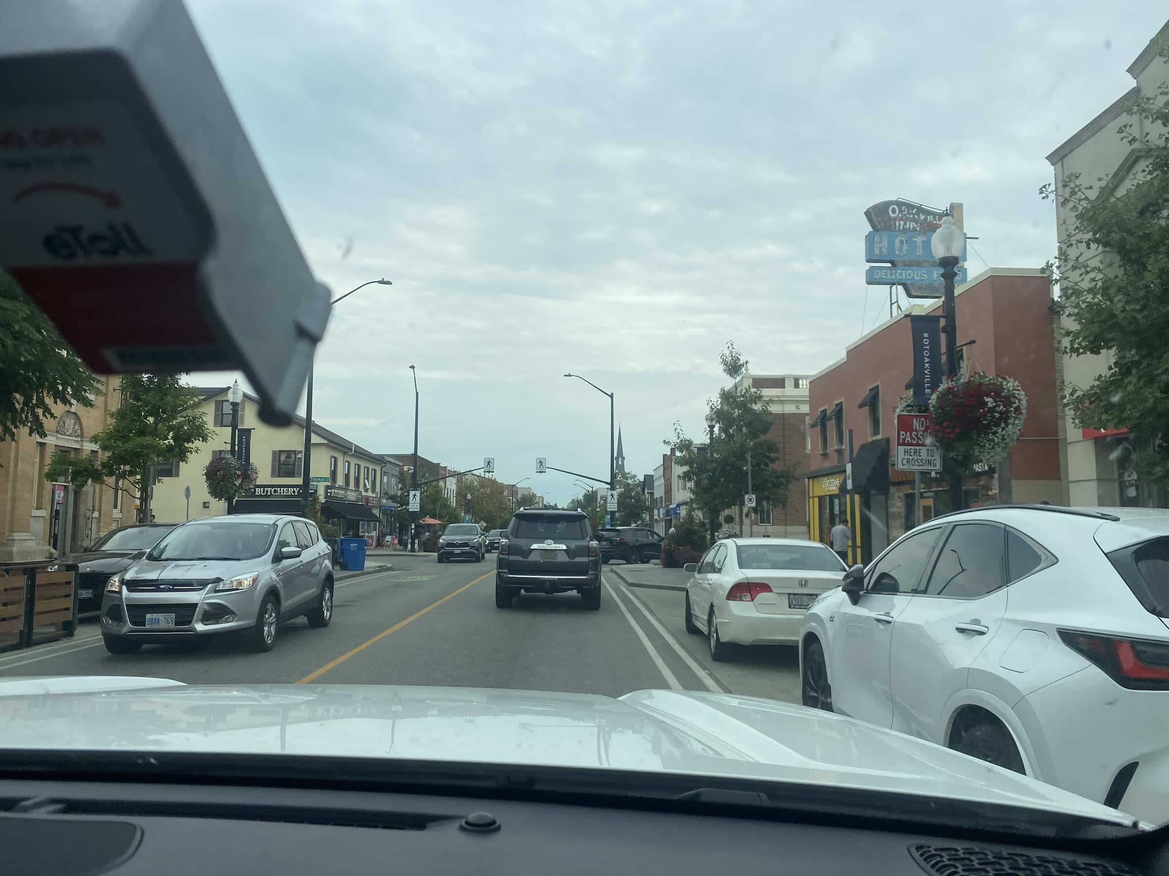 East_Coast_Roadtrip_views_from_passenger_side_gallery_01-00038 a street view of a main road in canada taken through the front windscreen